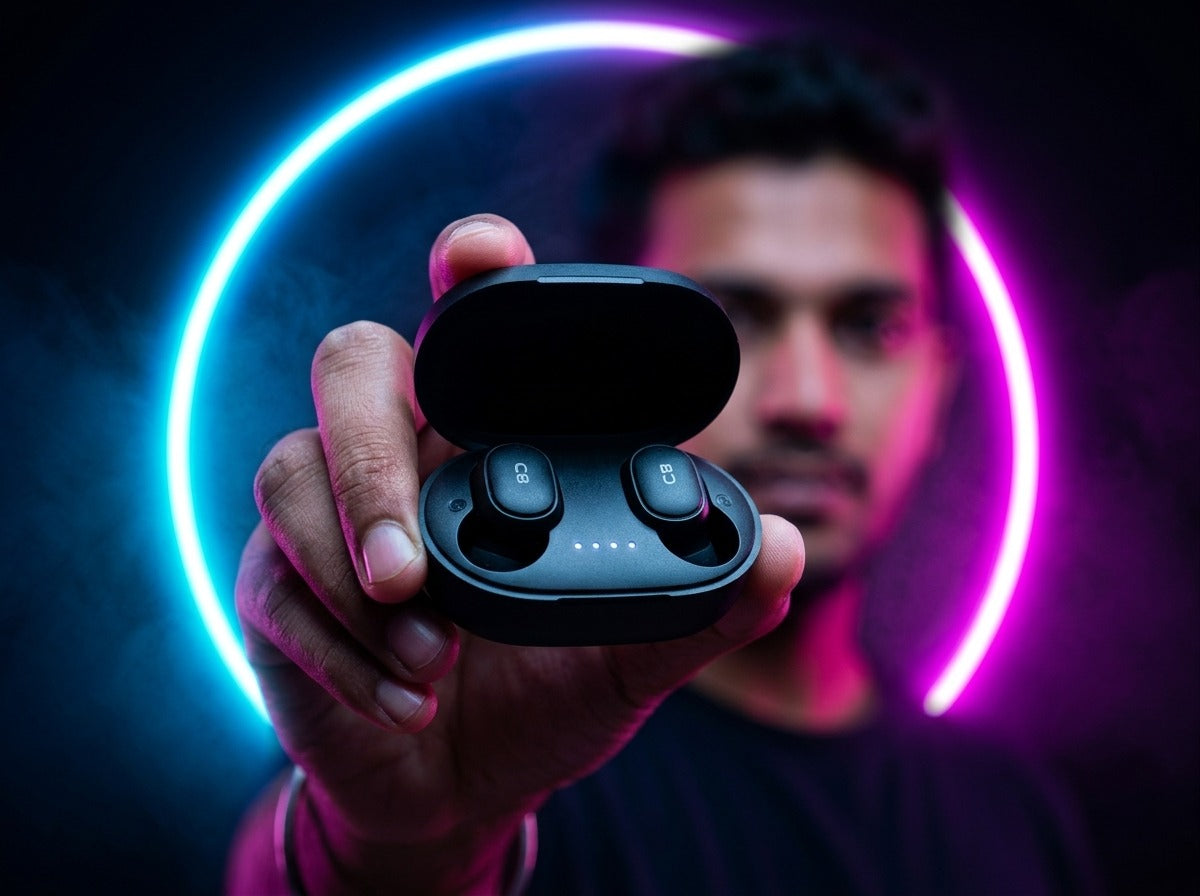 User showcasing CTRL8 A6S wireless earbuds in sleek black charging case with vibrant neon lighting