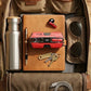 CTRL8 K8 true wireless earbuds in red displayed inside a backpack with keys, notebook, sunglasses, and water bottle
